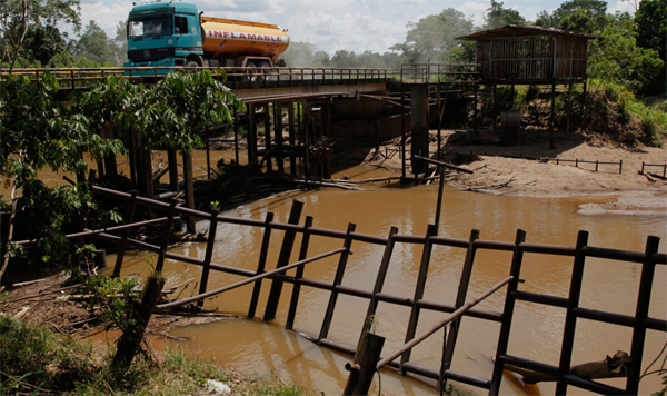 An oil tanker drives through Ecuador's Yasuní national park 