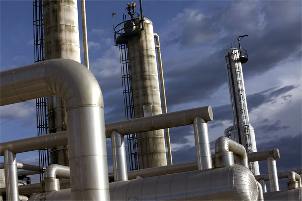 Storage tanks at state energy company YPFB’s natural gas plant near Santa Cruz, Bolivia. (Noah Friedman-Rudovsky/Bloomberg)