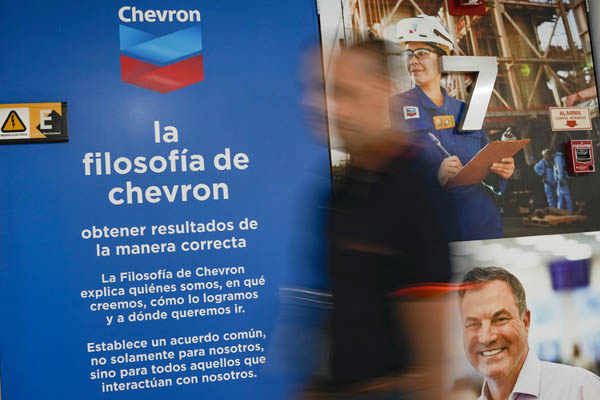 A Chevron Global Technology Services Company logo is seen at an administrative office in Caracas, Venezuela, on Thursday, Dec. 1, 2022. 