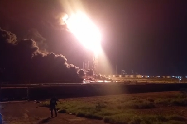 View of the fire reported in a waste lagoon at the Cardón Refinery, Falcon state, on Monday, December 26, 2022.  