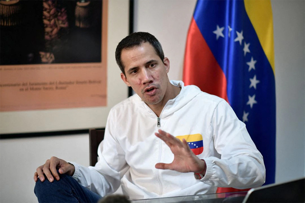 Venezuelan opposition leader Juan Guaido speaks during an interview with Reuters, in Caracas, Venezuela, December 6, 2022.