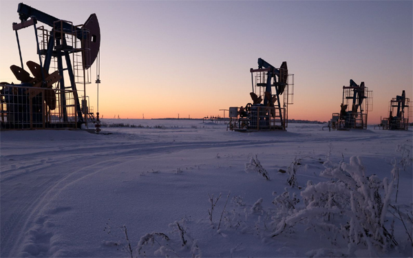 Oil pump jacks at an oil field in Yelkhovneft, Russia. 
