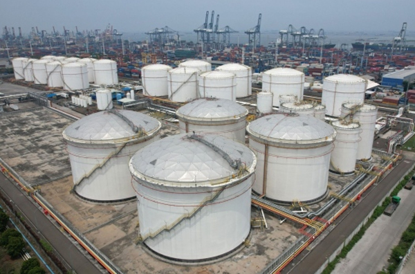 Fuel storage tanks at a PT Pertamina facility at Tanjung Priok Port in Jakarta, Indonesia, on Monday, Dec. 5, 2022. Pertamina is looking to buy crude for the February arrival to its Cilacap refinery, according to a tender document seen by Bloomberg.