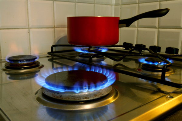 Natural gas burns on a stove top.Photographer: Suzanne Plunkett/Bloomberg