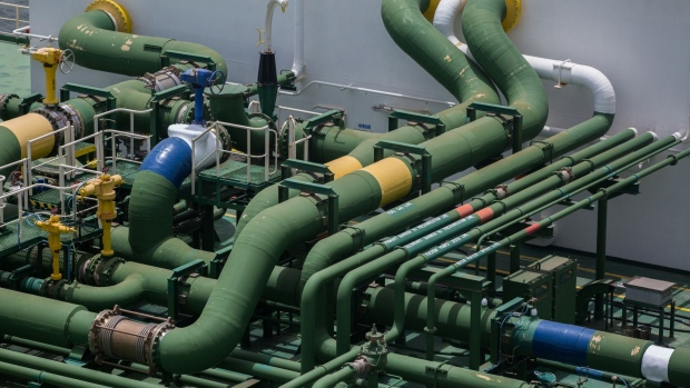 The pipes of the UMM BAB liquefied natural gas (LNG) tanker at PGP Consortium Ltd. LNG Terminal in Karachi, Pakistan, on Friday, June 24, 2022. This is the third time this month that Pakistan failed to complete an liquefied natural gas (LNG) tender for July, and the country’s inability to purchase fuel threatens to exacerbate electricity shortages just as hotter weather boosts air conditioning and power demand. 