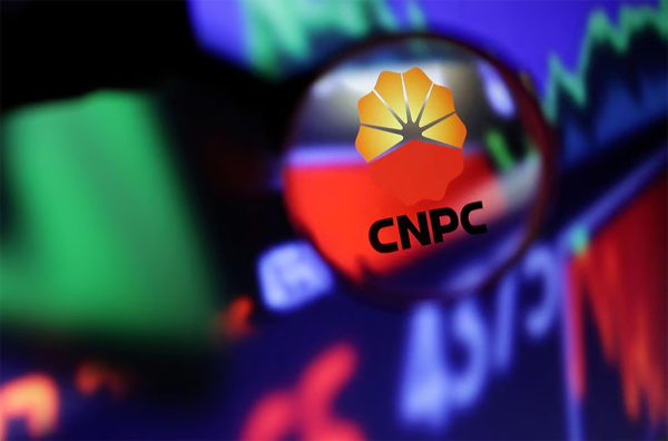 CNPC (China National Petroleum Corporation) logo and stock graph are seen through magnifier displayed in this illustration taken September 4, 2022.  