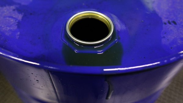 Excess fluid sits on the rim of a barrel of oil based lubricant at Rock Oil Ltd.'s factory in Warrington, U.K., on Monday, March 13, 2017.