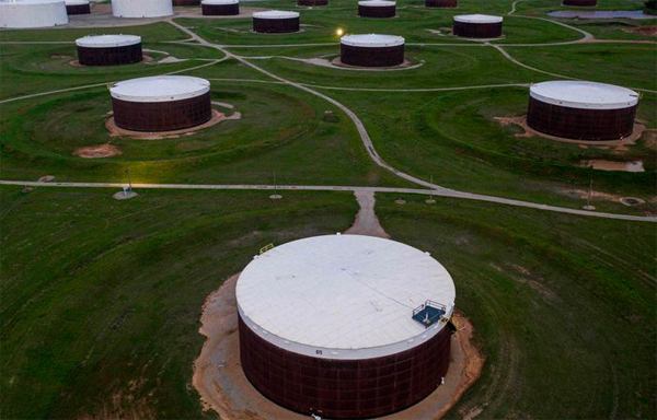 EIA reports a 7.6 million-barrel weekly rise in U.S. crude supplies. (AFP)