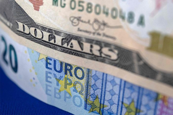 U.S. dollar and Euro bills-AFP