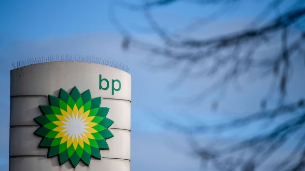 A BP logo on totem sign at a BP Plc petrol station on the side of the North Circular road in London, U.K., on Tuesday, Feb. 2, 2021. BP Plc showed that Big Oil has barely begun to heal the wounds from last year's historic slump, posting earnings that fell short of expectations on weak fuel sales, refining margins and gas trading.  