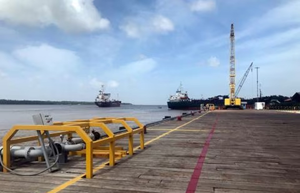 Vessels carrying supplies for an offshore oil platform operated by Exxon Mobil are seen at the Guyana Shore Base Inc wharf on the Demerara River, south of Georgetown, Guyana January 23, 2020. 