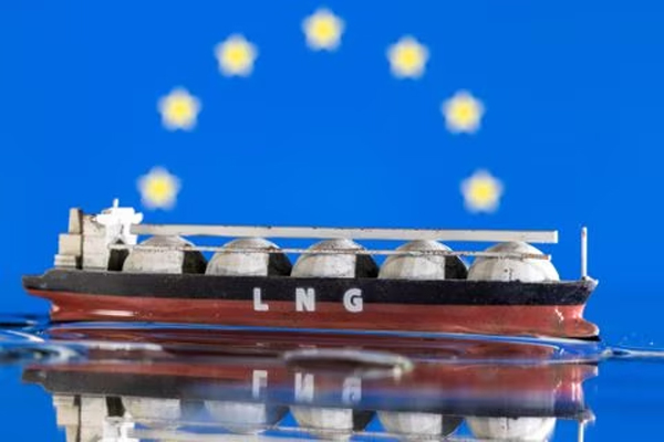 Model of LNG tanker is seen in front of the EU flag in this illustration taken May 19, 2022. 