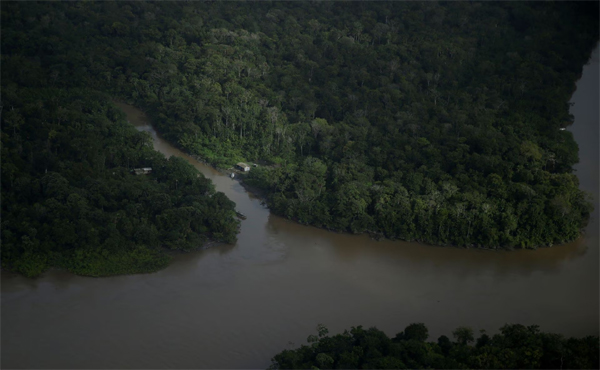  A house stands among rivers next to the mouth of Amazonas River on the coast of Amapa state, near Macapa city, northern Brazil, March 31, 2017.  