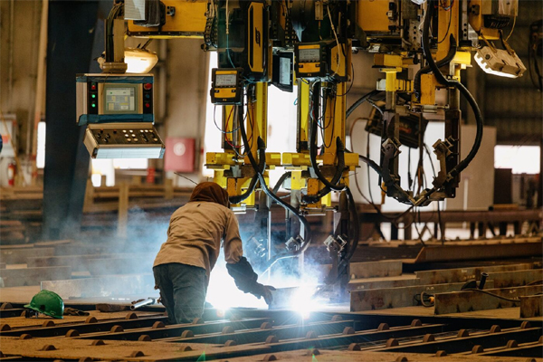 A worker welds steel for the construction of the 262-foot Eco Edison vessel at a shipyard in Houma, Louisiana.P 
