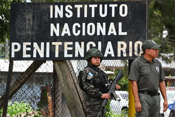 Honduran soldiers guard the facilities of the Women's Center for Social Adaptation (CEFAS) prison after the riot on June 20, 2023.  