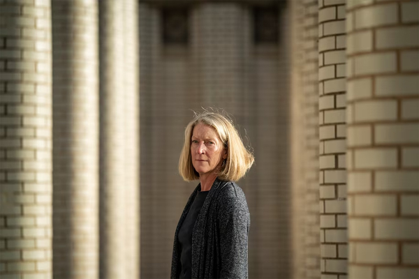 Mary McCord, a former federal prosecutor, poses for a portrait at Georgetown University Law Center on Oct. 4, 2021, in D.C. (Jabin Botsford/The Washington Post)