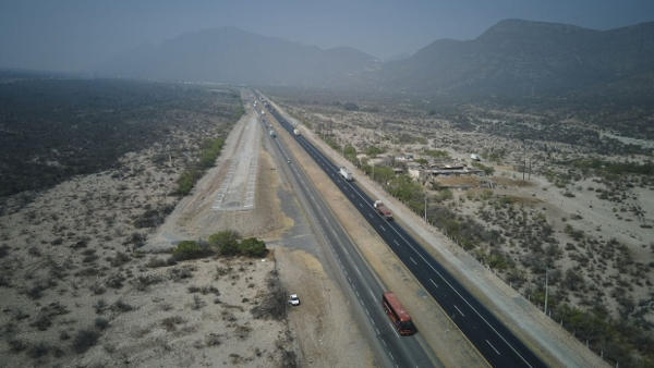 The expected site of a Tesla Gigafactory project near a highway in Santa Catarina, Nuevo Leon state, Mexico, on Tuesday, March 7, 2023.  