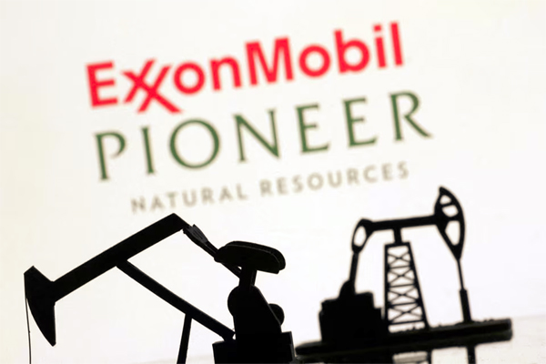 Exxon Mobil Corp's resurgence under CEO Darren Woods and the upcoming retirement of Pioneer Natural Resources CEO Scott Sheffield were key to the oil major clinching the $60 billion acquisition, people familiar with the matter said.