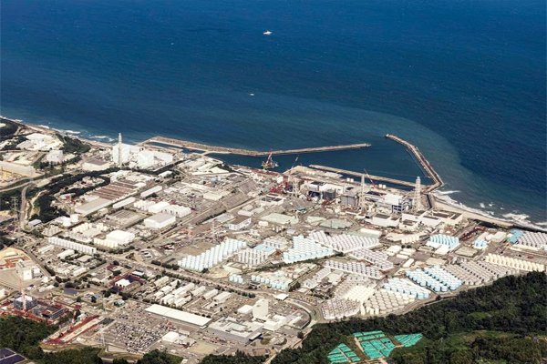 An aerial view shows the Fukushima Daiichi nuclear power plant, which started releasing treated radioactive water into the Pacific Ocean, in Okuma town, Fukushima prefecture, Japan August 24, 2023, in this photo taken by Kyodo.  