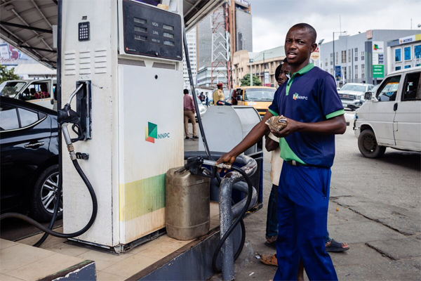 The cost of filling a fuel can in Nigeria has more than tripled since subsidies were abolished in May. Demand has slumped as a result. (Benson Ibeabuchi/Bloomberg)