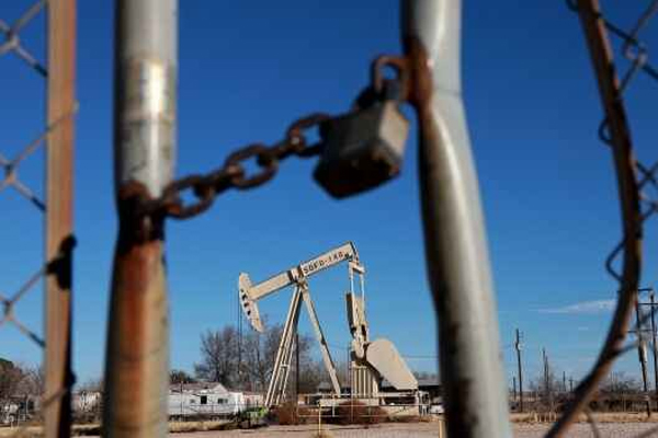 An oil pumpjack in the Permian Basin oil field in Odessa, Texas. Photographer: Joe Raedle/Getty Images
