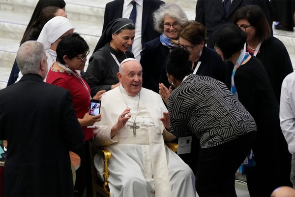 Pope Francis meeting with a group of women Saturday at the Vatican before a session of the Synod of Bishops. (Alessandra Tarantino/Associated Press)