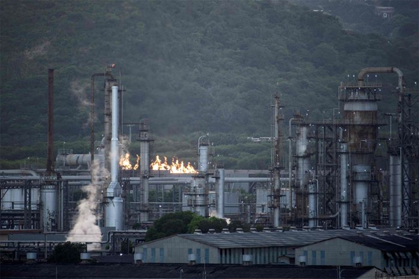  Venezuela’s oil industry has seen years of underinvestment and loss of skilled labor, said economists at Capital Economics. Yuri Cortez/Agence France-Presse/Getty Images 