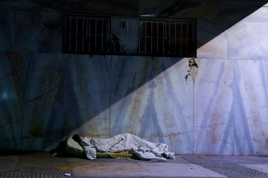 As poverty hits 40%, some are forced to sleep in the streets, while the peso has lost 90% of its value since 2019, with an estimated $250 billion stashed abroad in dollars. Natacha Pisarenko/Associated Press