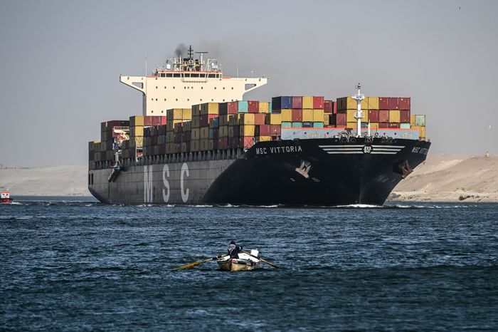 A cargo vessel makes its way through the Suez Canal toward the Red Sea, where Houthi attacks on ships escalated during the first half of December. Photo: mohamed hossam/Shutterstock