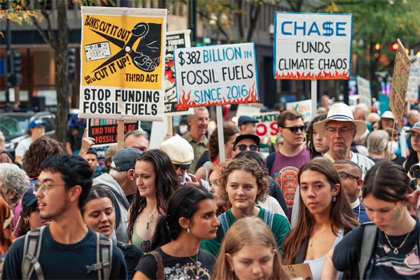 Environmental activists march during the Global Climate Strike in downtown Chicago, Illinois, on 15 September 2023. Photograph: Kamil Krzaczyński/AFP