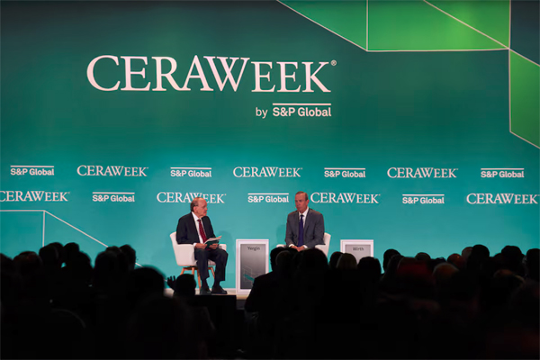 Mike Wirth, the CEO of Chevron Corporation, speaks with Daniel Yergin, the vice chairman of S&P Global, as top energy executives and officials from around the world gather during the CERAWeek 2023 by S&P Global, energy conference in Houston, Texas, U.S., March 6, 2023. REUTERS/Callaghan O'Hare