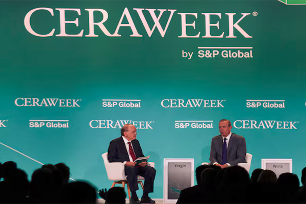 Mike Wirth, the CEO of Chevron Corporation, speaks with Daniel Yergin, the vice chairman of S&P Global, as top energy executives and officials from around the world gather during the CERAWeek 2023 by S&P Global, energy conference in Houston, Texas, U.S., March 6, 2023. REUTERS/Callaghan O'Hare