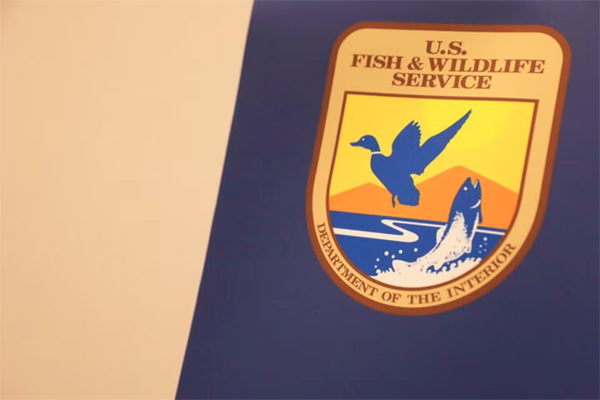 The seal of the U.S. Fish and Wildlife Service is seen at their headquarters in Bailey's Crossroads, Virginia, U.S., May 11, 2021. REUTERS/Andrew Kelly