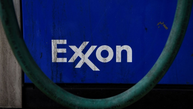 Signage at an Exxon Mobil Corp. gas station in Houston, Texas, U.S., on Wednesday, Oct. 28, 2020. Exxon is scheduled to release earnings figures on October 30. Photographer: Callaghan O'Hare/Bloomberg , Bloomberg