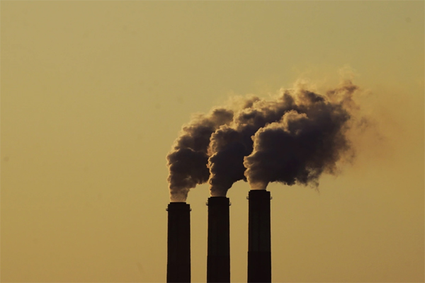 Emissions rise from the smokestacks at the Jeffrey Energy Center coal power plant near Emmett, Kan., on Sept. 18Charlie Riedel / AP Photo file