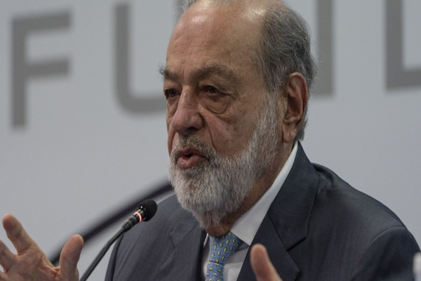 Carlos Slim, chairman emeritus of America Movil SAB, speaks during a press conference in Mexico City, Mexico, on Monday, Feb. 12, 2024. Last week, shares in Slim's tower company Operadora de Sites Mexicanos jumped by the most intraday in three months amid expectations the stock will be included in Mexico's benchmark stock index. Photographer: Alejandro Cegarra/Bloomberg , Bloomberg