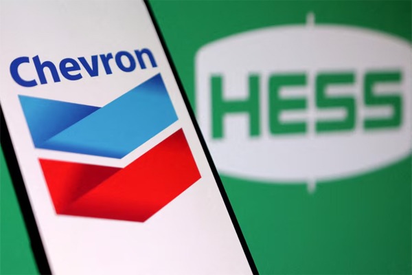 Chevron and Hess logos are seen in this illustration taken, October 23, 2023. REUTERS/Dado Ruvic/Illustration