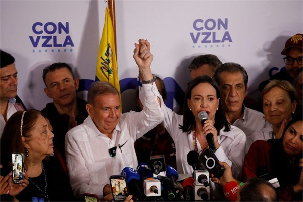 enezuelan opposition leader Maria Corina Machado and opposition presidential candidate Edmundo Gonzalez hold a press conference after the electoral authority announced that Venezuelan President Nicolas Maduro has won a third term, during the presidential election, in Caracas, Venezuela July 29, 2024. REUTERS/Leonardo Fernandez Viloria