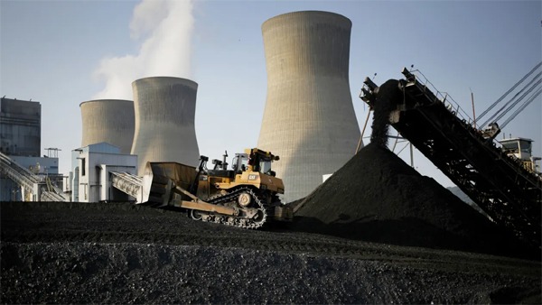 A bulldozer moves coal that will be burned to generate electricity at the American Electric Power coal-fired power plant in Winfield, West Virginia.
Luke Sharrett | Bloomberg | Getty Images