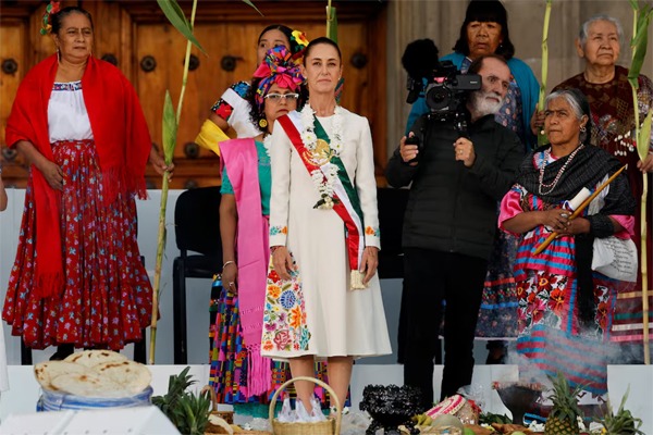 Mexico's new President Claudia Sheinbaum participates in a ceremony where she receives the "baton of command", at Zocalo Square in Mexico City, Mexico October 1, 2024. REUTERS/Daniel Becerril