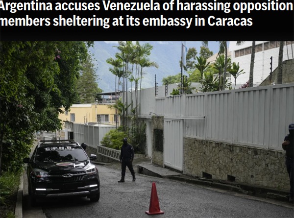 A police patrol car sits parked outside Argentina’s embassy where some members of Venezuela’s opposition are seeking asylum inside, in Caracas, Venezuela, July 31, 2024, three days after the contested presidential election. (AP Photo/Matias Delacroix, File)