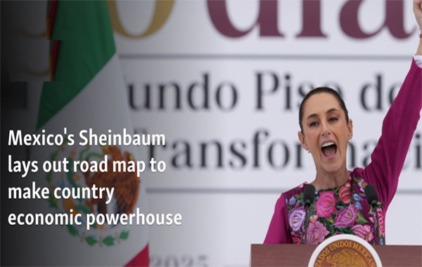 President Claudia Sheinbaum gestures to the crowd during an event marking her first 100 days in office, at the Zócalo, Mexico City's main square, in Mexico City, Jan. 12, 2025.