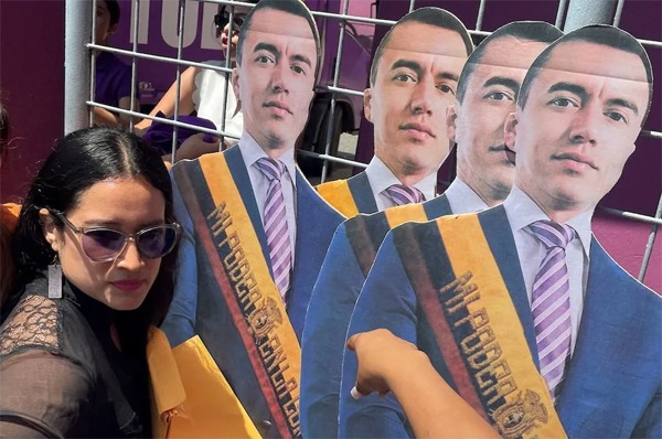 Supporters hold cardboard cutouts of Ecuadorian President Daniel Noboa, days before the Ecuadorian presidential election, in Guayaquil, Ecuador, on Feb. 4, 2025.  REUTERS/Luisa Gonzalez